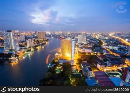 Aerial view of Bangkok Skyline along Chaophraya River at dusk