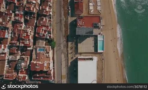 Aerial view of Barcelona coastline, Spain. Beach and houses along the sea