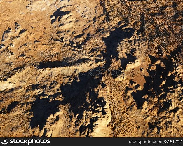 Aerial view of barren arrid desert landscape.