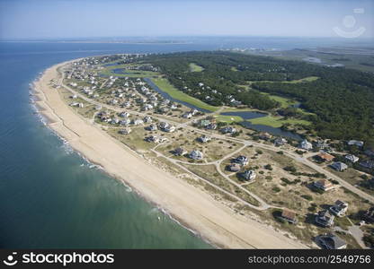 Aerial view of beach and residential neighborhood at Bald Head Island, North Carolina.