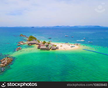 Aerial view of beach at Koh Khai, a small island, with crowd of people, tourists, blue turquoise seawater with Andaman sea in Phuket island in summer, Thailand in travel trip. Nature landscape.