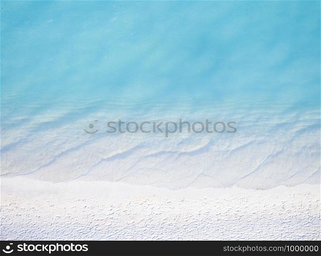 Aerial view of Beautiful crystal clear water and white beach