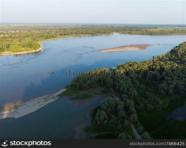 Aerial view of big siberian Ob river in beauty summer day, drone shot. Aerial view of big siberian Ob river