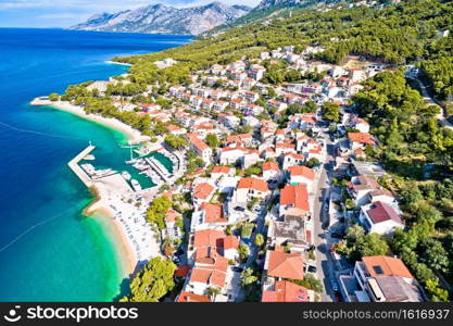 Aerial view of Brela beach and waterfront on Makarska riviera, Dalmatia region of Croatia