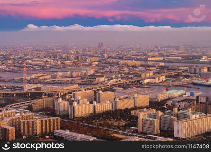 Aerial view of bridges and roads in Osaka downtown. Skyline with skyscraper buildings in Kansai district, urban city, Japan. Architecture landscape background.