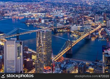 Aerial view of Brooklyn bridge and Manhattan bridge with Brooklyn cityscape skyscrapers bulding from Lower Manhattan in New York City New York State NY , USA