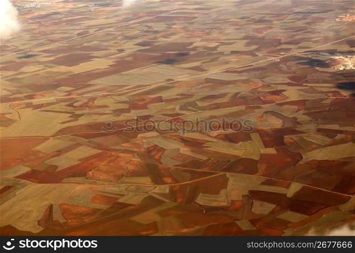 aerial view of brown cereal and grape fields in Spain