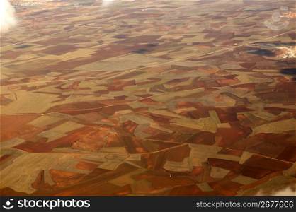 aerial view of brown cereal and grape fields in Spain