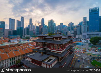 Aerial view of Buddha Tooth Relic Temple in China town, Singapore Downtown skyline. Financial district and business centers in technology smart urban city in Asia. Skyscraper and high-rise buildings.