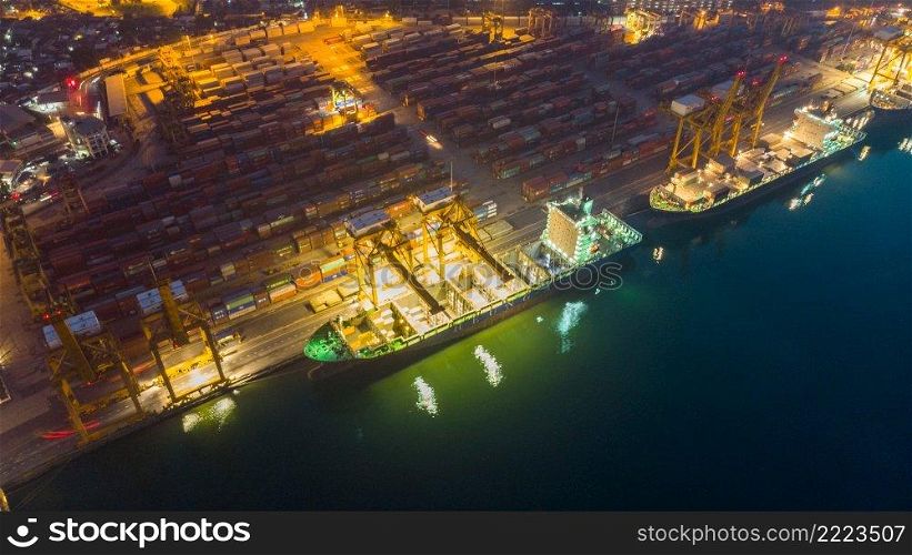 Aerial view of cargo ship with cargo container on sea.