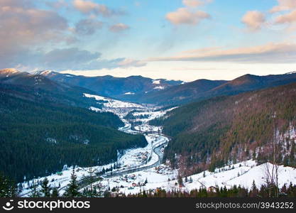 Aerial view of Carpathians Mountains with river and village