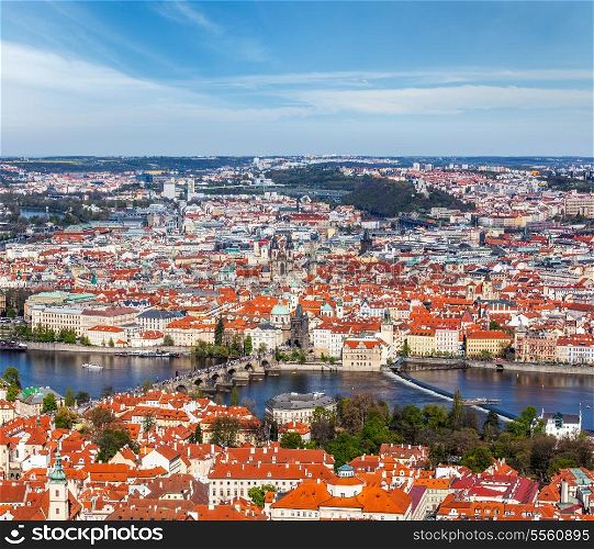 Aerial view of Charles Bridge over Vltava river and Old city from Petrin hill Observation Tower. Prague, Czech Republic