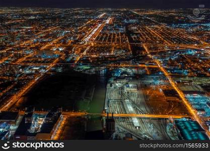 Aerial view of Chicago cityscape skyscraper under the blue sky at night time in Chicago, Illinois, United States, Landscape and Modern Architecture concept
