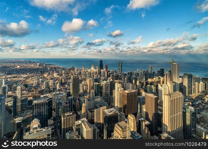Aerial view of Chicago skyline panorama with blue sky and cloud at beautiful sunset time in Chicago, Illinois, United States, Landscape and Modern Architecture concept