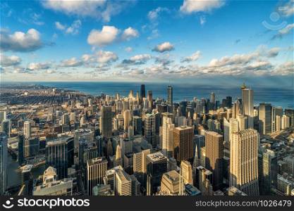 Aerial view of Chicago skyline panorama with blue sky and cloud at beautiful sunset time in Chicago, Illinois, United States, Landscape and Modern Architecture concept