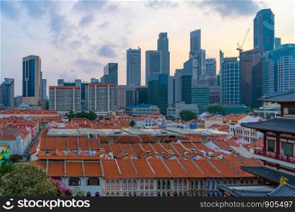 Aerial view of China town, Singapore Downtown skyline at sunset. Financial district and business centers in technology smart urban city in Asia. Skyscraper and high-rise buildings.