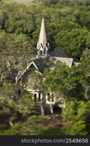 Aerial view of church surrounded by trees on Bald Head Island, North Carolina.