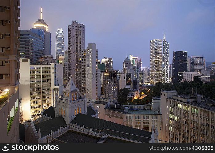 Aerial view of city architecture at dusk, Hong Kong, China