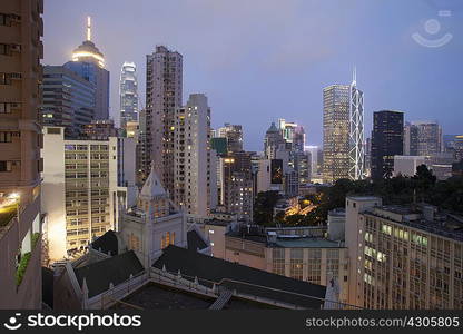 Aerial view of city architecture at dusk, Hong Kong, China