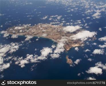 Aerial view of clouds over an island