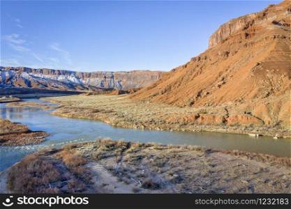 Aerial view of Colorado River at Rocky Rapid above Moab, Utah in winter scenery