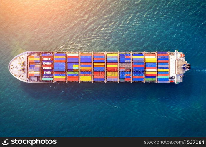 Aerial view of container cargo ship in sea.