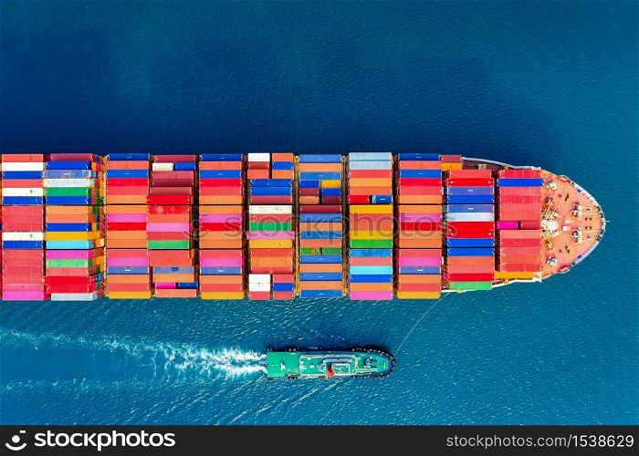 Aerial view of container cargo ship in sea.