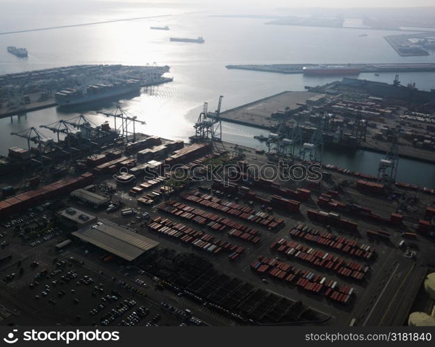 Aerial view of dock with cargo containers for shipping in Los Angeles, California.