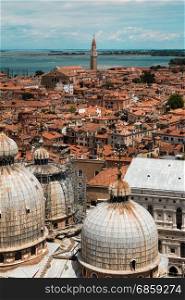 Aerial view of Domed Roof of Saint Marks Cathedral and Houses in Venice, Italy