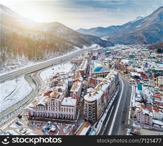 Aerial view of Estosadok settlement in valley under ski resorts of Sochi in Krasnodar Krai, Russia