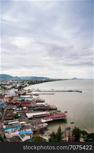 Aerial view of famous Hua Hin beach and bay in evening with cityscape. Thailand tropical beach destination