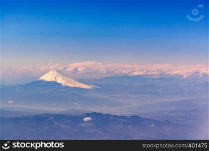 Aerial view of Fuji san, Mountain Fuji, landmark mountain of Japan. Take from Airplane while fly pass Fuji City Shizuoka Japan,