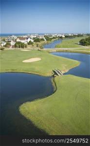 Aerial view of golf course in coastal residential community at Bald Head Island, North Carolina.