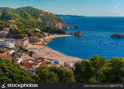 Aerial view of Gran Platja beach and Badia de Tossa bay in Tossa de Mar on the Costa Brava, Catalunya, Spain