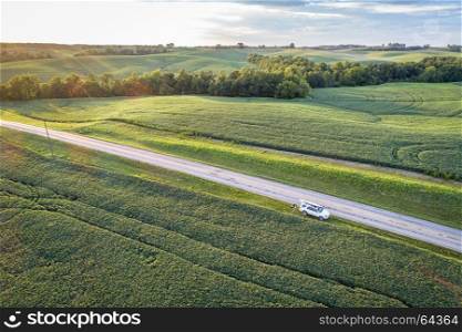 aerial view of green soybean fields and highway in Missouri, late summer