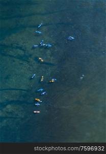 Aerial view of group of surfers, Bali, Indonesia