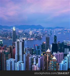 Aerial view of Hong Kong skyline and Victoria Harbor at sunset. Travel destinations