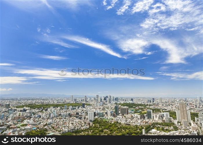 Aerial view of houses, parks, skyscrapers and office buildings in Tokyo City, Japan, Asia