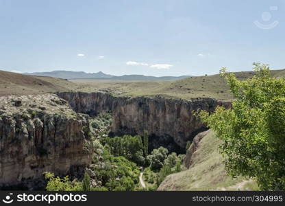 Aerial view of Ihlara Valley, along gorge cut into volcanic rock in the southern part of Cappadocia in Aksaray,Turkey. Aerial view of Ihlara Valley in Aksaray,Turkey