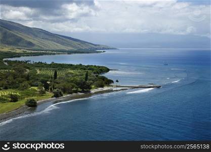 Aerial view of jetty on coastline of Maui, Hawaii.