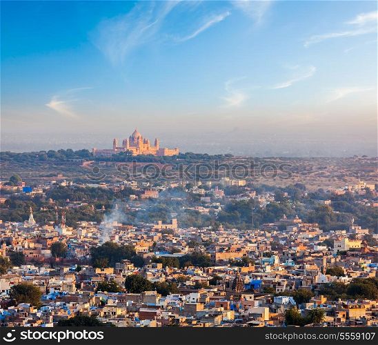 Aerial view of Jodhpur - the Blue city - with Umaid Bhawan Palace on sunset. View from Mehrangarh Fort. Jodphur, Rajasthan, India