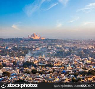Aerial view of Jodhpur - the Blue city - with Umaid Bhawan Palace on sunset. View from Mehrangarh Fort. Jodphur, Rajasthan, India