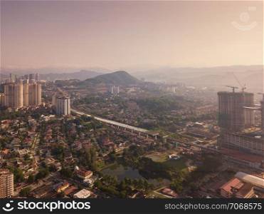 Aerial view of Kuala Lumpur Downtown, Malaysia. Residential houses district in urban city in Asia. Buildings at noon.