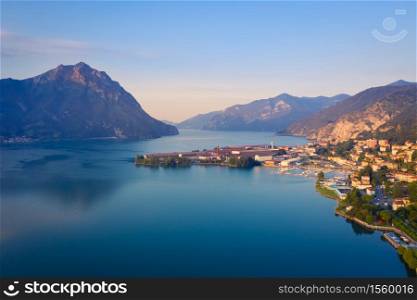Aerial view of Lake Iseo at sunrise, on the right the port of lovere,background mountains(alps), Bergamo Italy.