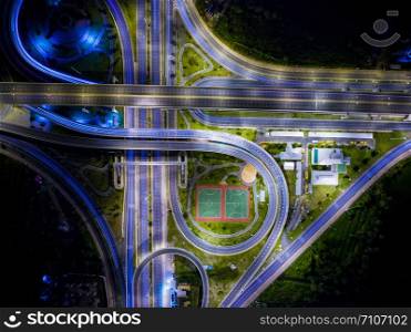 Aerial view of landscape beautiful night road, Interchange Highway traffic beautiful at Night.