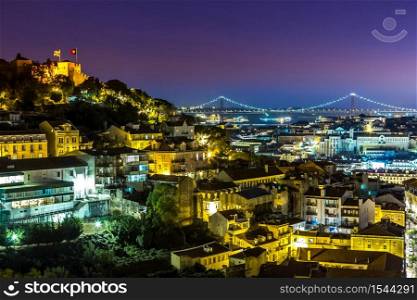Aerial view of Lisbon at night, Portugal. Sao Jorge Castle