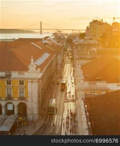 Aerial view of Lisbon Old Town street at sunset, Portugal