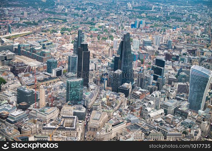 Aerial view of London skyscrapers as seen from helicopter.