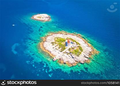Aerial view of lonely island with lighthouse, Korcula riviera of Croatia, island Vela Sestrica