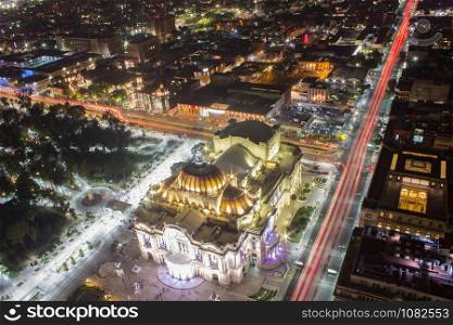 Aerial view of Mexico City, light trails and Bellas Artes.